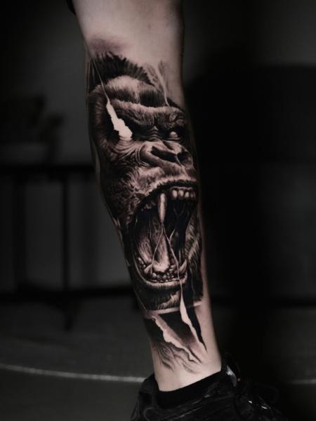 Realism roaring gorilla tattoo by @dast.one