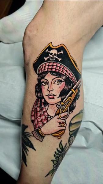 Traditional pirate woman tattoo by @panosntolas