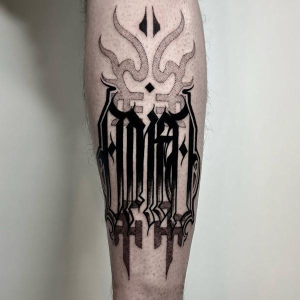 Blackwork abstract lettering tattoo by @lune82er