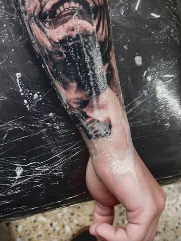 Realism horror portrait tattoo by @panayiotis_so