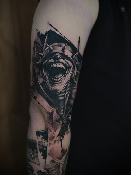 Realism screaming figure tattoo by @panayiotis_so