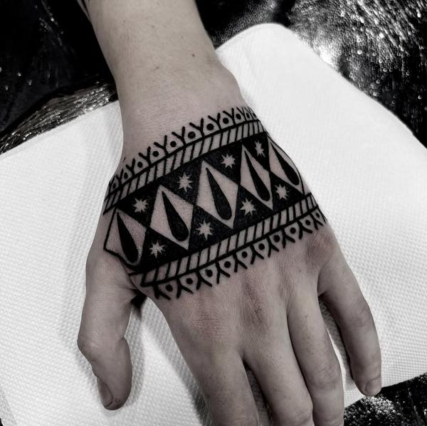 Blackwork geometric pattern tattoo by @stonerstattoo