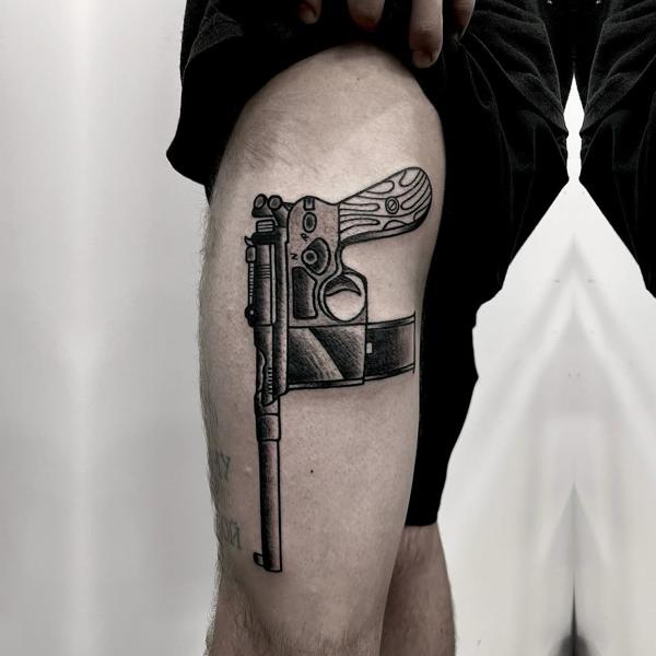 Blackwork vintage pistol tattoo by @stonerstattoo