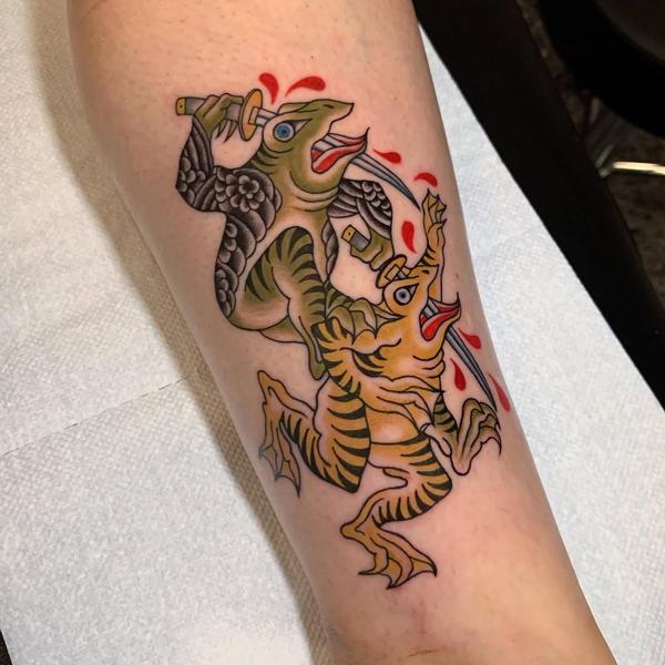 Traditional fighting frogs tattoo by @ksr_junx