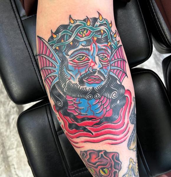 Traditional crowned figure tattoo by @ksr_junx