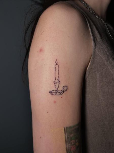 Fine line candle tattoo by @littletinypoke