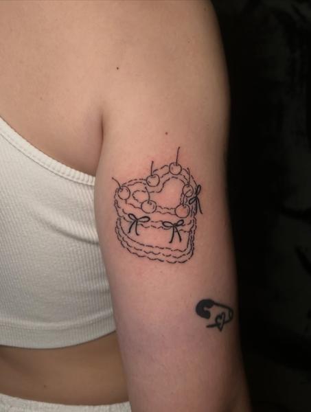 Fine line cherry cake tattoo by @littletinypoke
