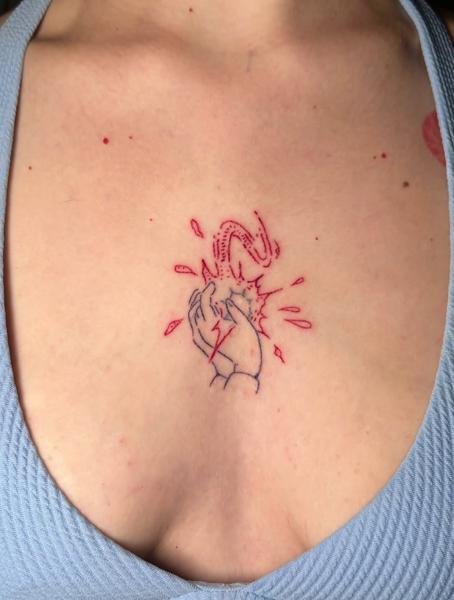 Fine line hands with energy tattoo by @littletinypoke