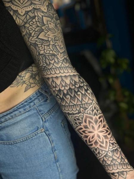 Ornamental mandala sleeve tattoo by @parispamelatattoo