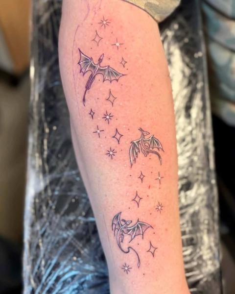 Illustrative flying dragons tattoo by @mrdbtattoo