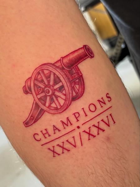 Illustrative arsenal cannon tattoo by @mrdbtattoo