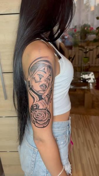 Blackwork woman and rose tattoo by @kulo_tattoo_art