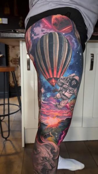 Realism astronaut and balloon tattoo by @k_peanut_