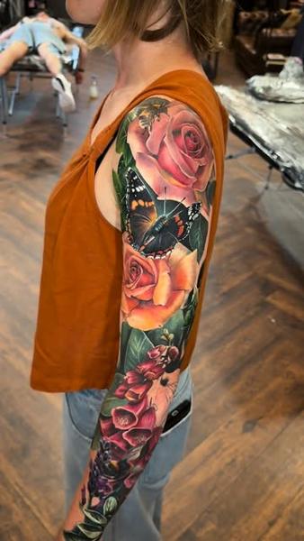 Realism floral butterfly tattoo by @k_peanut_