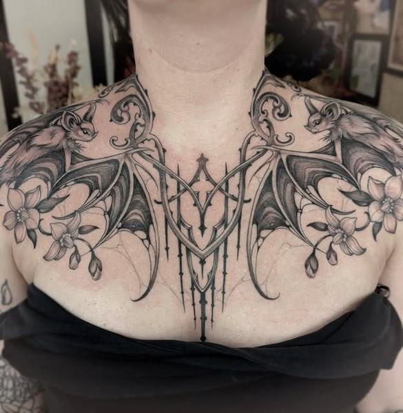 Blackwork bat and flowers tattoo by @penelopetentakles