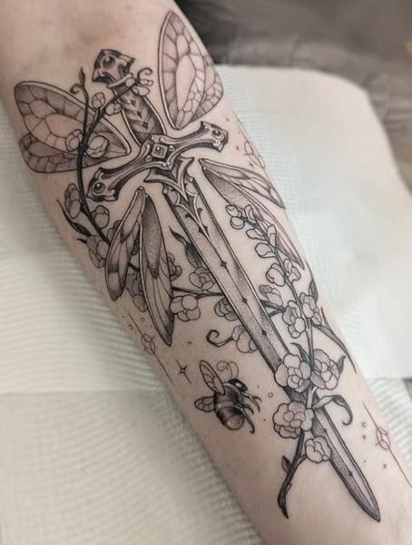 Fine line sword and flowers tattoo by @penelopetentakles