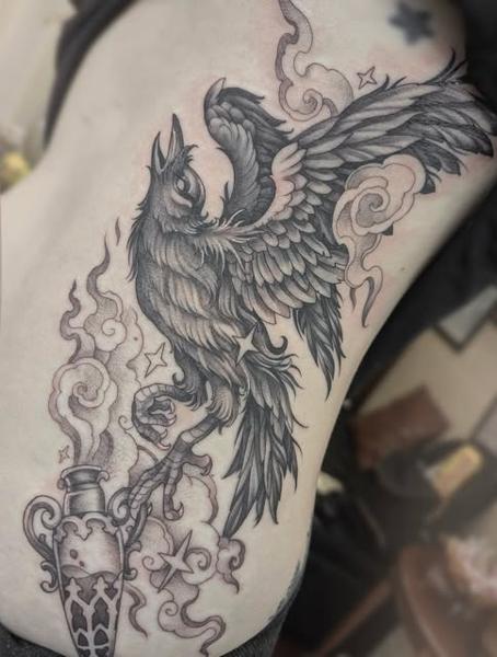 Blackwork phoenix tattoo by @penelopetentakles