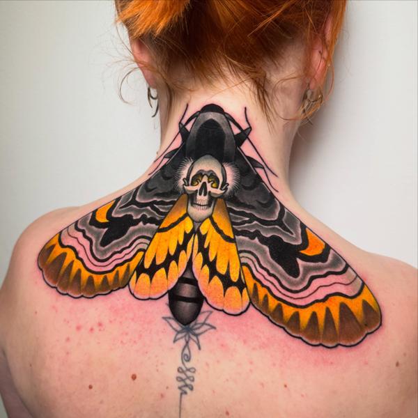 Traditional moth with skull tattoo by @petermurrayartist