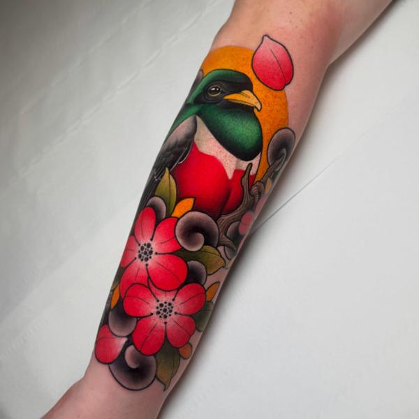 Traditional bird and flowers tattoo by @petermurrayartist