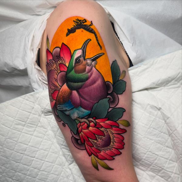 Traditional bird and flower tattoo by @petermurrayartist
