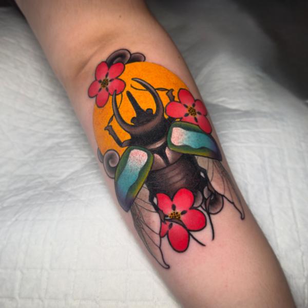 Traditional beetle and flowers tattoo by @petermurrayartist