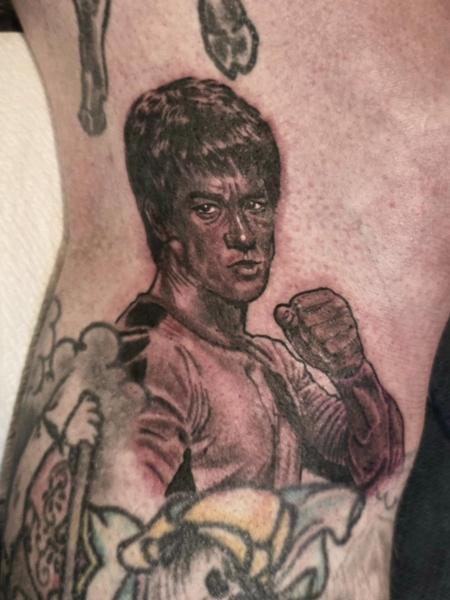 Realism martial artist portrait tattoo by @phil_t88