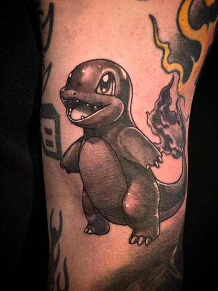 Realism charmander tattoo by @phil_t88