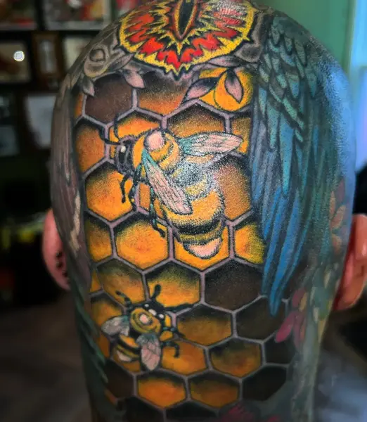 Neo-traditional bees honeycomb tattoo by @philmoody_tattoos