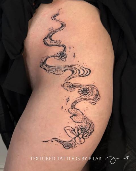 Fine line flowing water lilies tattoo by @artbymateospi