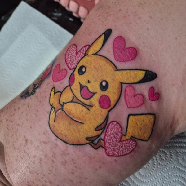 Anime pikachu with hearts tattoo by @pixierobsontattoo