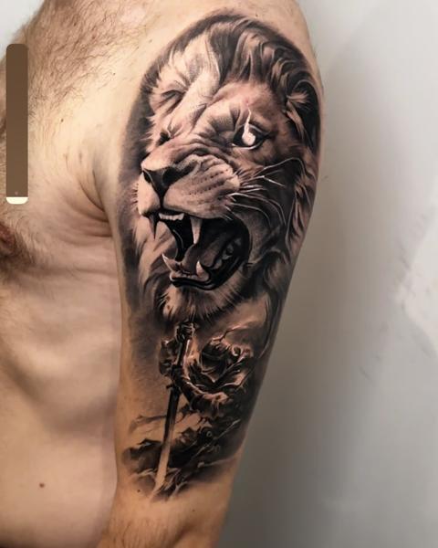 Realism lion warrior tattoo by @plamenkozarov