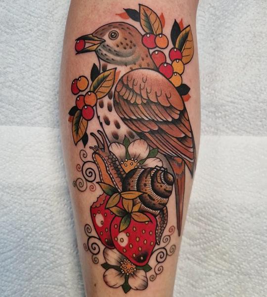 Traditional bird and snail tattoo by @rabtattoo