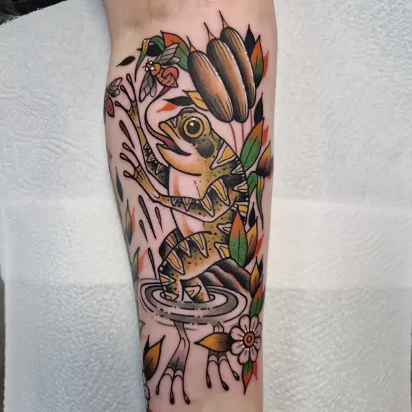Traditional frog and flowers tattoo by @rabtattoo