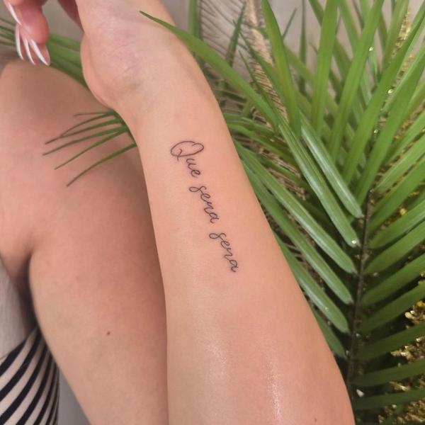 Fine line script text tattoo by @rachaelmarie.floraink