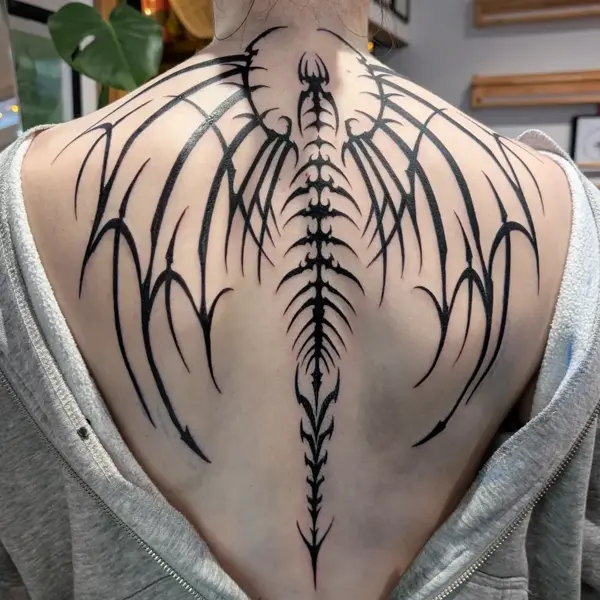 Tribal tribal wings tattoo by @inkleigh.tattoo