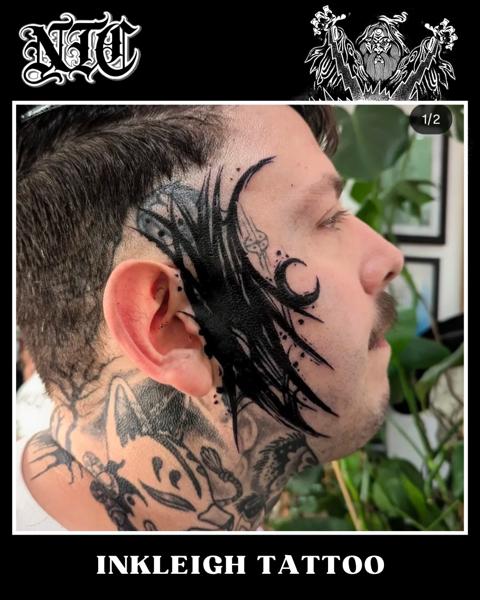 Blackwork abstract face tattoo by @inkleigh.tattoo