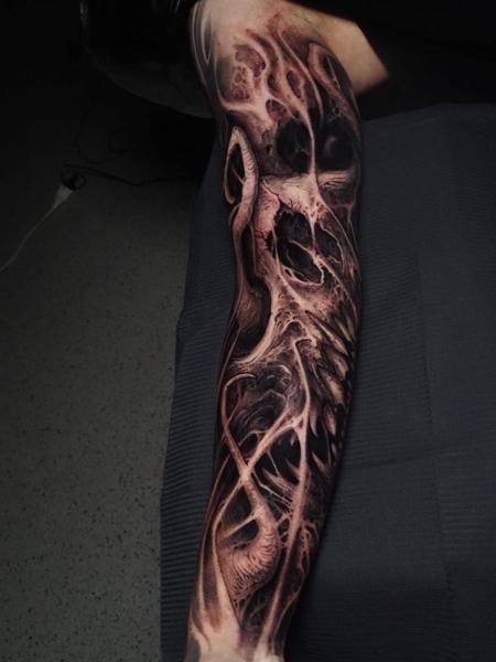Biomechanical biomechanical skull tattoo by @raydems