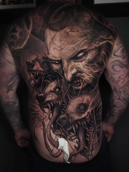 Realism demonic face tattoo by @raydems
