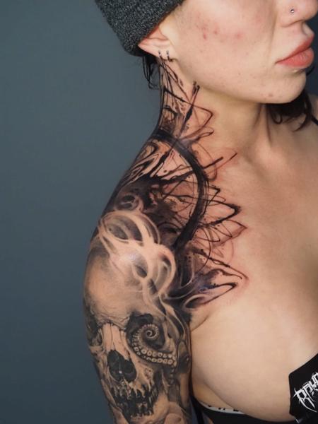 Realism skull and tentacles tattoo by @raydems