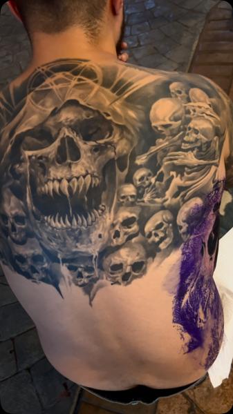 Realism skull collage tattoo by @razvanand