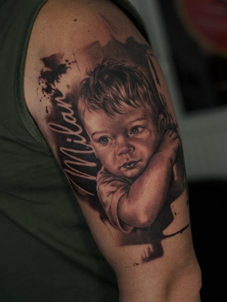 Realism child portrait tattoo by @razvanand