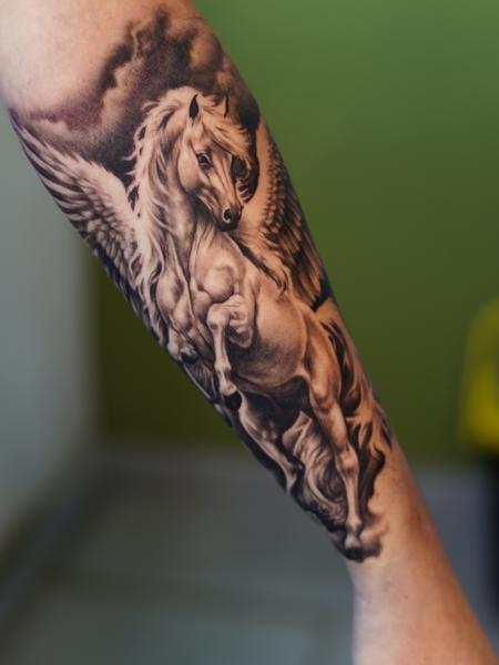 Realism pegasus tattoo by @razvanand