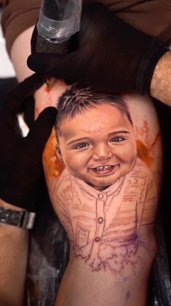 Realism child portrait tattoo by @razvanand