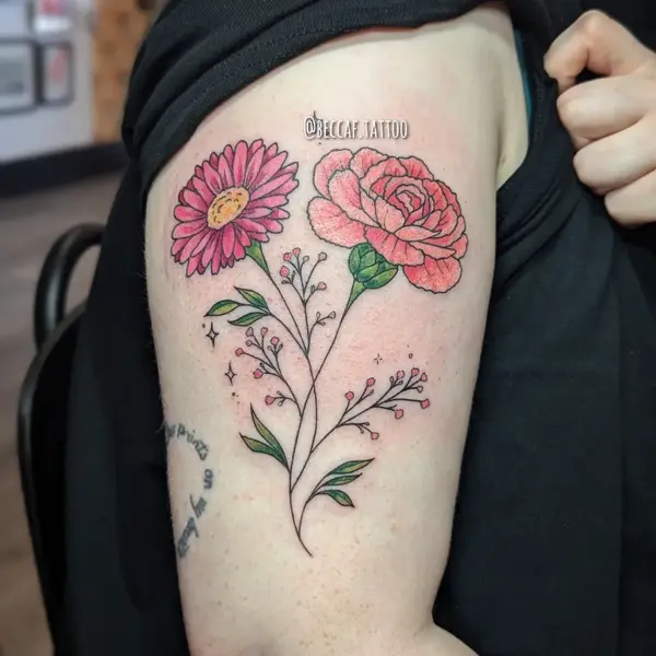 Illustrative floral sprigs tattoo by @beccaf.tattoo