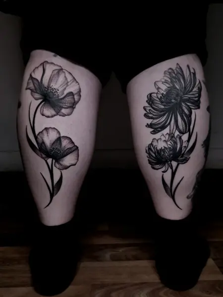 Blackwork floral design tattoo by @bex_hoodless