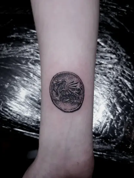 Realism dragon coin tattoo by @bex_hoodless