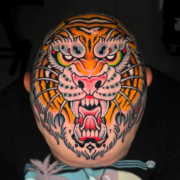 Traditional tiger face tattoo by @reece_bolt