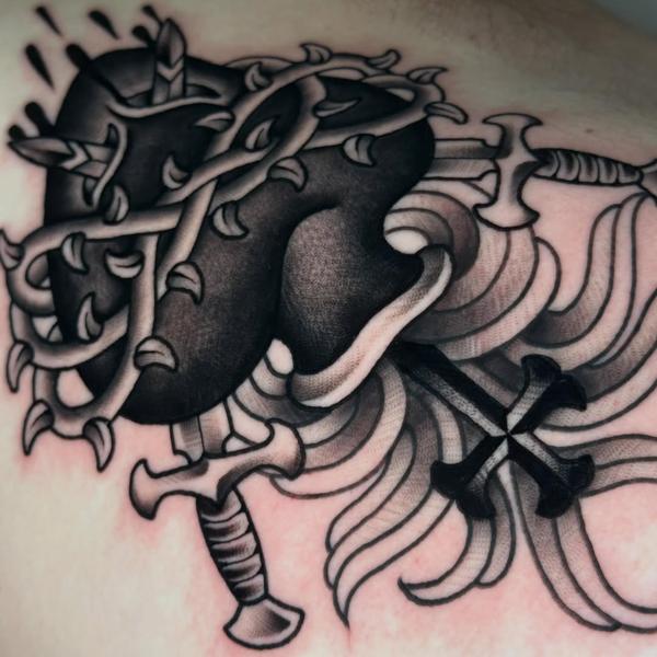 Blackwork heart with swords tattoo by @reece_bolt