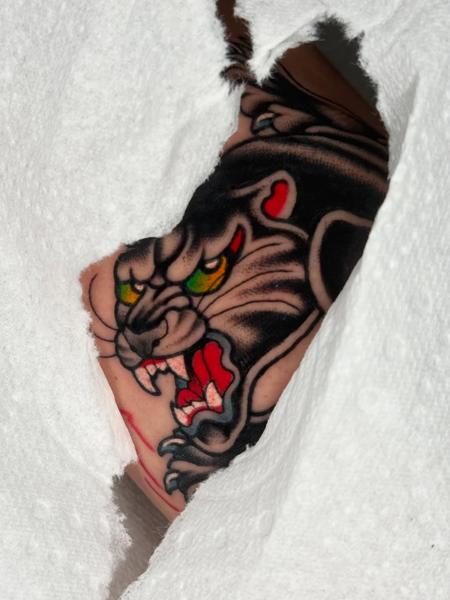 Traditional panther head tattoo by @reece_bolt