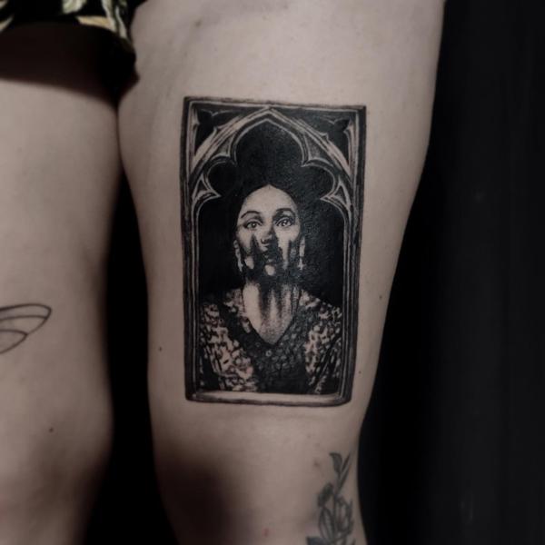 Realism distorted portrait tattoo by @regna.sm_tattooer